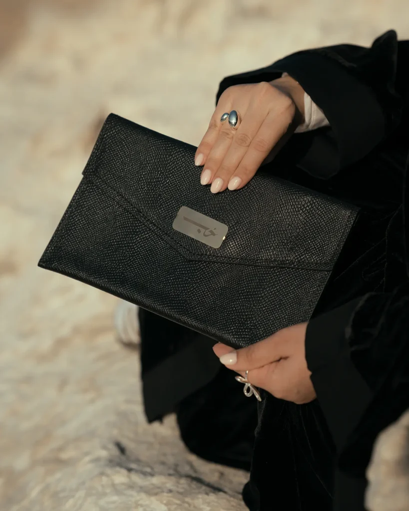 Maroon Trove Handbag Oman Stone Model Hand
