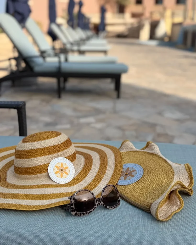 Shati Set Trove Hat Bag Sunglasses in bed