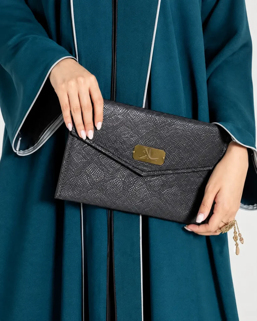Salam Trove Hand Bag Black in model hand